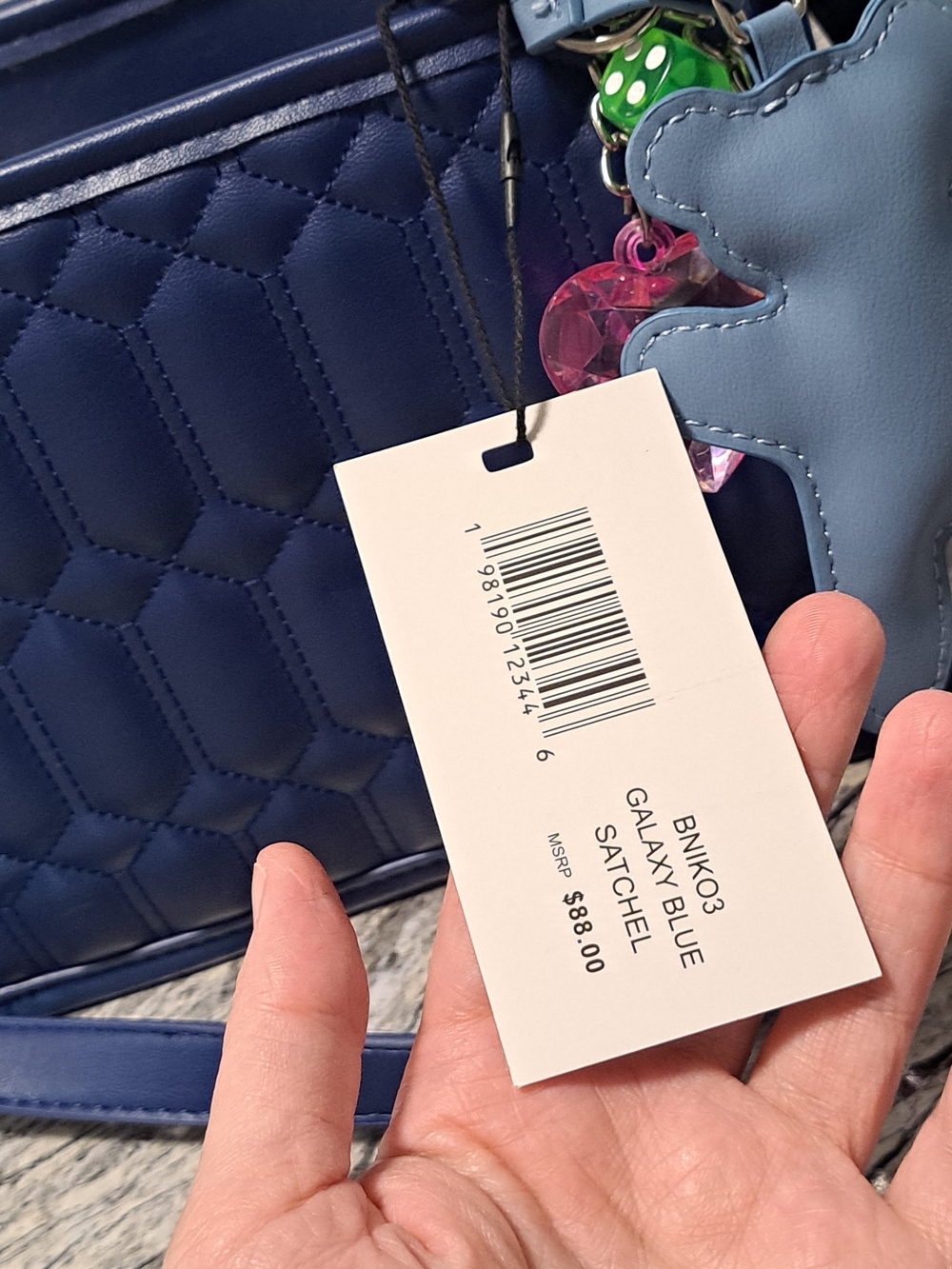 Steve Madden Navy Binko Quilted Satchel with Bag Charms & Cross.\nBody Strap - Picture 5 of 6